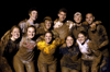 A Midnight Mudness team shows off their mudiness.  Pictured left to right: front row - Sarah Herzog, Kristin Veach, Stephanie Jones, Cameron Humble and Andrea Hofmann; back row - Kelly Reid, Becca Barkley, Chris Arnold, Luke Pruett and Joel Polk. - Photo by Kathleen Murray