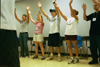 Paul Monroe's FOCUS group raises the roof during New Student Orientation 2002. - Photo by Amanda Smith