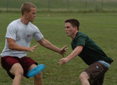 Intramural Ultimate Frisbee Action - SAE Michael Mercer guards Onion Micah Moyers.