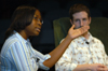 DMS major Jande Jackson talks about her film <i>Milking the Town</i> with host Eric Murrell during the 2004 Student Film Festival. - Photo by Jonathan Blair