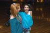 Freshman Abigail Carpenter and sophomore Lori Cunningham a rock out their glam attire at SAC sponsered 80s Skate Night. - Photo by Jonathan Blair