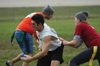 Justin Hutto gets tackled during the Young Alums' Turkey Bowl. - Photo by Kristen Hiller