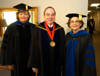 08/6/05 - Provost Carla Sanderson and President David S. Dockery pose with summer commencement speaker Carolyn G. Bishop, president for the Consortium for Global Education.
