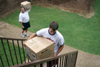 08/27/05 - Mike MacPherson moves into his dorm room during Freshman Move-In Day.