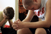 08/28/05 - Freshmen Matt Elia of Bartlett, Tenn. and Parker Shipp of Murfreesboro, Tenn. pray during a Bible study with their resident assistant during New Student Orientation.