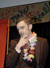 Sophomore Carson Turner strikes a pose at the SAC Game Show during New Student Orientation. - Photo by Kathleen Murray