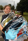 08/27/05 - Stephanie Berry hauls in another load of clothes on Freshman Move-In Day.