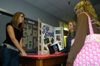 Senior Amber Lutz describes the Greek system to Freshmen Jesikah Stahl of Greenbriar, Tenn. and Felicia Morgan of Greenfield, Tenn. at the Student Life Fair during New Student Orientation. - Photo by Heather Phillips