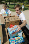 09/2/05 - Junior Landon Preston and Freshman Cara Chism help load supplies during one of the university's two Fill the Truck Fridays.  - Kristen Nicole Sayres