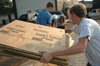 09/5/05 - SGA President Brad Spencer and other students ready boxes to be used for delivering donated goods to West Jackson Baptist Church to assist Hurricane Katrina victims. - Brad Moore