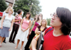 Gamma Rho Chi junior Merry Hindman, biology major,
leads her group of rushees to the Chi Omega lodge for skit night on Sept. 15.  While serving as a Rho Chi, Hindman, along with 13 other girls, was not
allowed to speak to her sorority sisters for a period of five months. - Photo by Kristen Nicole Sayres