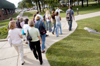 Ross Barnes leads his group of perspective students outside during their campus tour. - Photo by Brad Moore