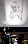 Dr. George Herring presented an interesting cartoon of Lyndon B. Johnson during an afternoon lecture on "The Reluctant Warrior: LBJ as Commander in Chief."  Dr. Herring was the speaker at the 2005 Carls-Schwerdfeger History Lecture Series. - Photo by Morris Abernathy
