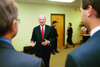 James Baker speaks with several faculty and students on campus before the Scholarship Banquet. - Photo by Jim Veneman