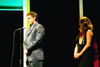Senior Class President Casey Stafford leads in prayer at the Sixth Annual Scholarship Banquet. - Photo by Jim Veneman