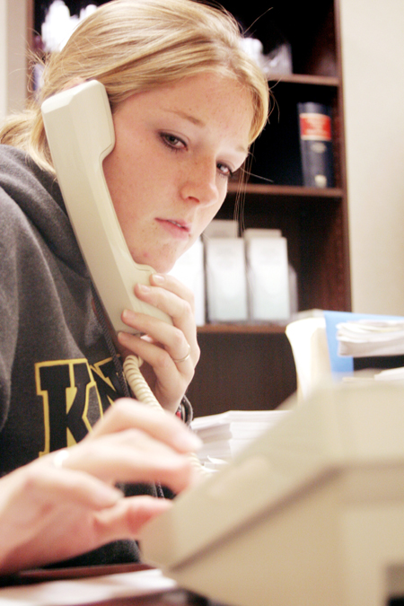 Sophomore Carolyn Negley of Chi Omega makes phone calls for pledges during the Greek Phonathon.
