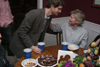 Sophomore Ronald Long thanks Pam Sutton, his English professor, for the soup and conversation. - Photo by Kyle Kurlick