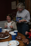 Pam Sutton, professor of English, brings out the Ziploc bags for left-overs after a student meal in her home. - Photo by Kyle Kurlick