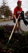 Nursing major Amber Boyd worked on a landscaping project at Cheyenne Trace Senior Living Center during her Day of Remembrance service project. - Photo by Heather Phillips