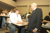 11/1/05 - Chick-fil-A founder Truett Cathy visits with Union student Kevin Roe prior to Cathy's Nov. 1 address to Union students.