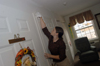 11/9/05 - Union sophomore Elizabeth Lovell, of Brownsville, Tenn., helps clean a resident's room at Alexandria Place, an assisted living facility, as part of Day of Remembrance. 