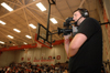 Junior Aaron Hardin of the Union Broadcasting Society mans a camera during the live broadcast of Union versus Oklahoma City University basketball. - Photo by Brad Moore