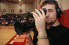 Junior Aaron Hardin of the Union Broadcasting Society mans a camera during the live broadcast of Union versus Oklahoma City University basketball. - Photo by Brad Moore