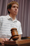 Senior Brad Spencer, outgoing SGA president, bangs the gavel for one last time at Union. - Photo by Kristen Nicole Sayres