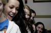 12/2/05 - Jessica Reed, Brynn Miller, Sarah Eastin, Christina Pool & Candace Todd enjoy themselves at a dorm room Christmas party.