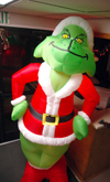 12/5/05 - The Grinch welcomes students to Hurt Commons during the holiday season.