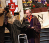 12/17/05 - Alisha Michelle Pinner receives her bachelor of science in psychology from President Dockery during fall graduation. - Morris Abernathy
