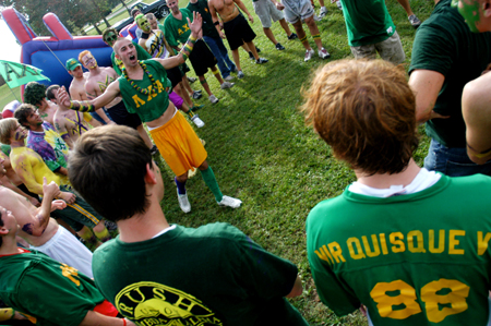 Senior Joel Polk pumps up his fellow Lambda Chis after new associates join the brothers on Bid Day.