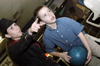 Laura Jackson advises her little brother during the Sibling Bowling night. - Photo by Kathleen Murray