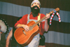 10/11/02 - Sophomore John Reed plays the guitar during the SAC Variety Show.
