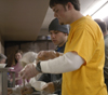 02/8/06 - Andrew Smith and other college students at Poplar Heights Baptist Church serve at a fund raising event for an upcoming GO trip. - Stephanny Rodriguez