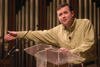 02/10/06 - Minister to the University Todd Brady emphasizes a point during a chapel service. - Stephanny Rodriguez