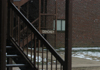 Large snowflakes falling outside the Dehoney building in the McAfee Residence Complex. - Photo by Heather Phillips