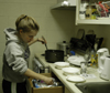 Rebecca Poe cooks some black bean soup for a dorm room dinner. - Photo by Stephanny Rodriguez