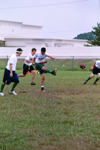 John Reed, Jonathan Grimm, and Kyle Edwards kickoff for Onions 1 in an intramural football game during Family Weekend 2002. - Photo by Lindsay Stavish