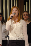 Abby Carpenter sings with the gospel choir during chapel. - Photo by Brad Moore