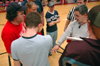 Brandon Boylan, asst. director of wellness, explains the rules of a wild and wacky game to the team captains. - Photo by Brad Moore