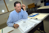 Michael Stewart teaches an MIS class for the MBA program on the Germantown campus. - Photo by Morris Abernathy