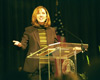 Former Taliban prisoner Dayna Curry gives her testimony during the chapel service.  - Photo by Jim Veneman