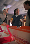 02/27/06 - Nathan Sing, Josh Clarke and Landon Preston enjoy Dunkin Donuts at the Rounders sign-up meeting. - Kyle Kurlick