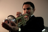 02/27/06 - Cosmin Jinariu plays his trumpet at the Coffee House night for Rounders sign-ups, held Feb. 27 in the student lounge. - Kyle Kurlick