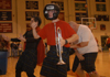 Adam Winters prepares to play his trumpet as a part of the crazy fan competition during Midnight Madness. - Photo by Jim Veneman