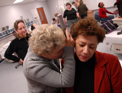 3/7/2006 - Pat Keene examines student Katheryn Bruton in a classroom demonstration of the otoscope during a RN-BSN class on the Germantown campus. (ID: 4897)