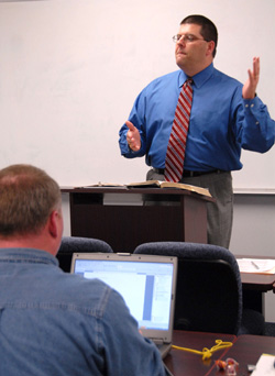 3/7/2006 - Charles Fowler, senior vice president for university relations and associate professor of Christian ministries and education, leads an MCS class on the Germantown campus. (ID: 4902)