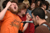 Greenwood's biggest fan, Mitchell Manley, ignites the crowd with excitement during the Welcome Back Concert - a time that Union welcomes back its own for a night of music and discussion. - Photo by Brad Moore