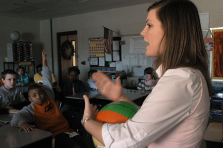 <em>C&C Photo Story:</em> Tricia Currin teaches her language arts class and reveiws with the children before they take a test. Currin enjoys teaching with
fun methods. During reveiw Currin answers any questions the children have and emphasize what
will be on the test. Afterwards, the children rely on Currin to administer the test.